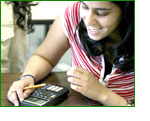 teenager using a graphing calculator